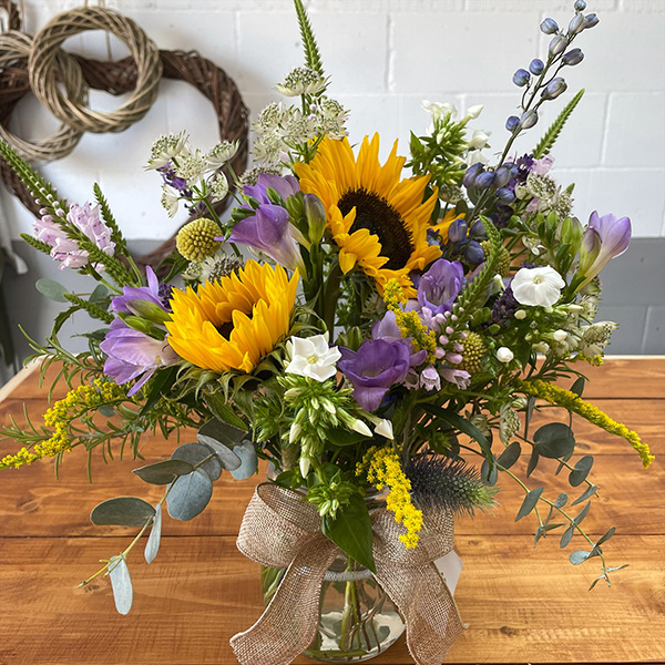 Sunflower, eucalyptus, lilac yellow white bouqet of flowers Cambridge